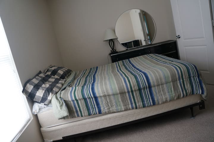 Back bedroom, queen size pillow top mattress. Sleeps like a dream.