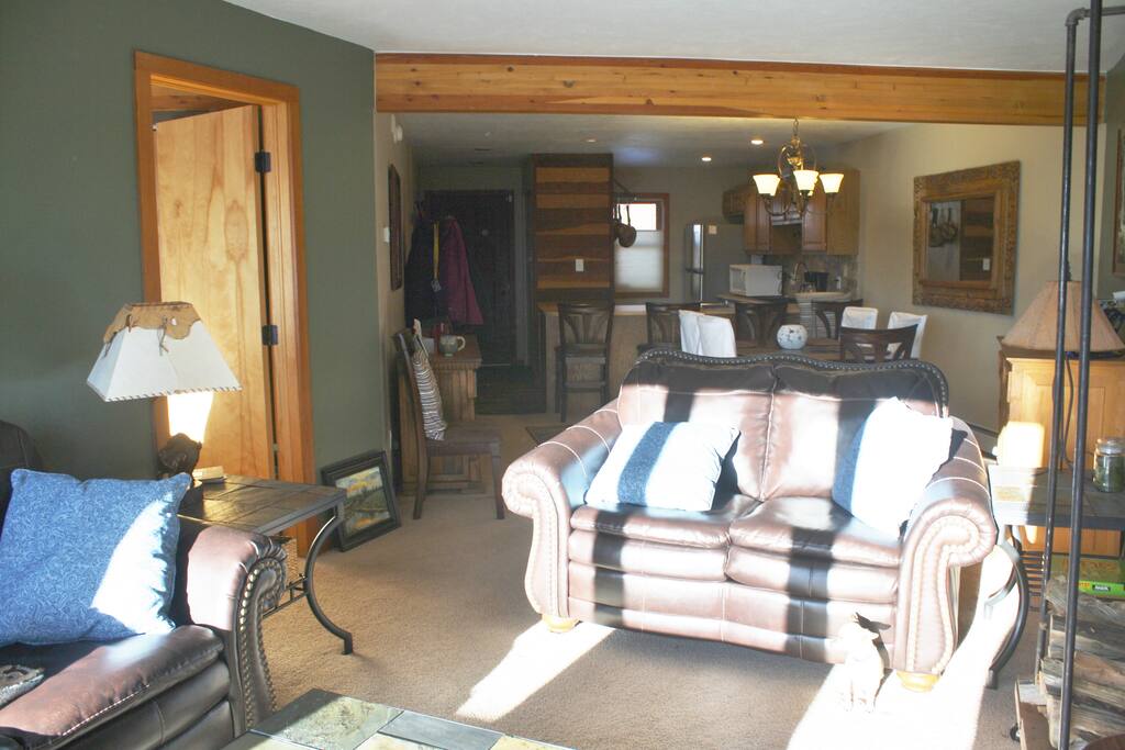 sitting area next to fireplace and tv
