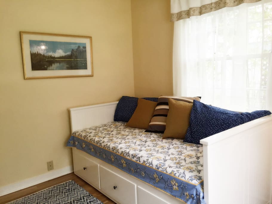 Beautiful twin day bed pulls out to make a comfortable queen to sleep 2.