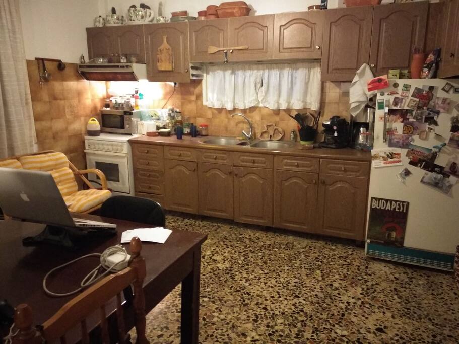 The kitchen with a microwave, refrigerator and an espresso coffee machine. Our village is famous for the quality of his table water.