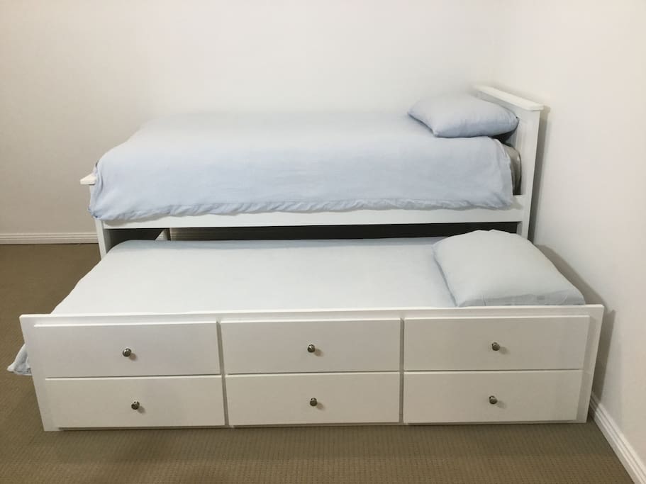Trundle bed for the kids. Portacot also available on request