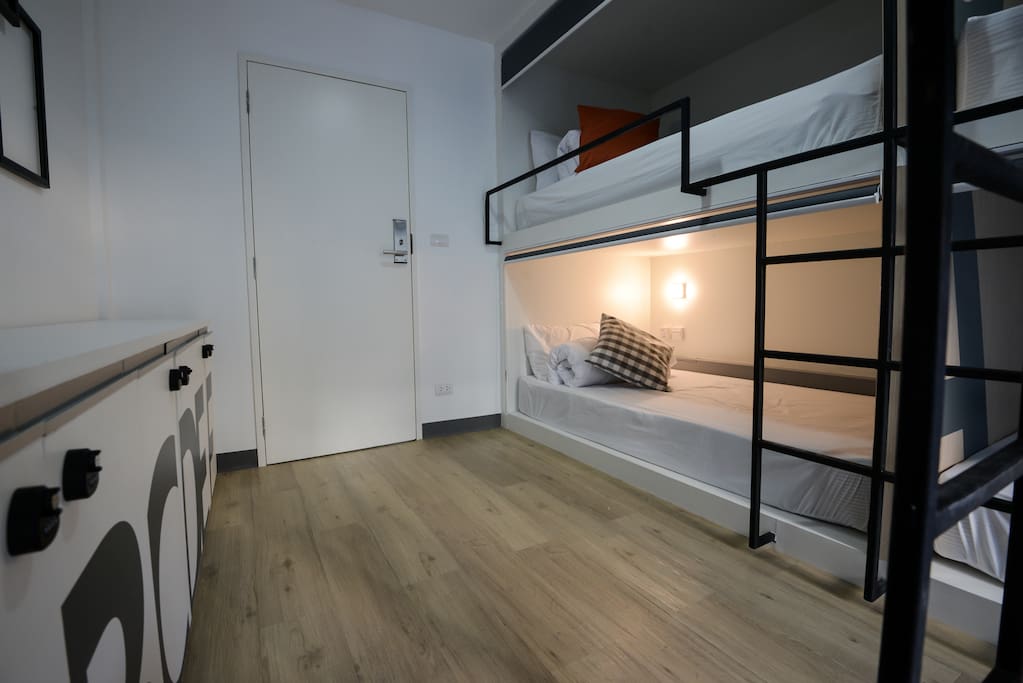 single bed in dorm room
