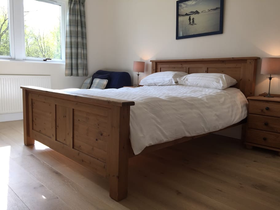 Warm, cosy room with a king sized bed and a separate pull out chair bed