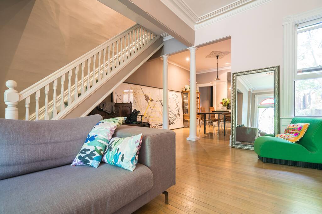 The living room flows into the dining room, only separated by two pillars.