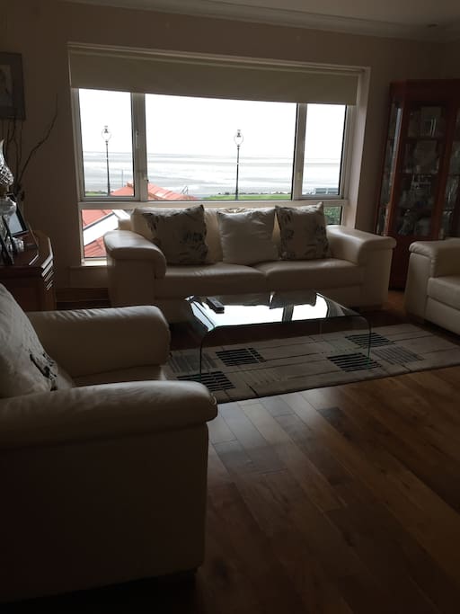 Lounge looking out on beach and Dublin bay