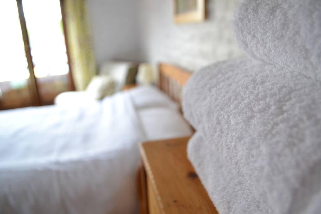 Professionally laundered pure cotton white linen & towels are provided