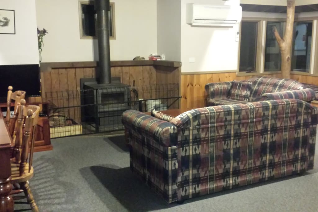 cosy lounges around woodfire