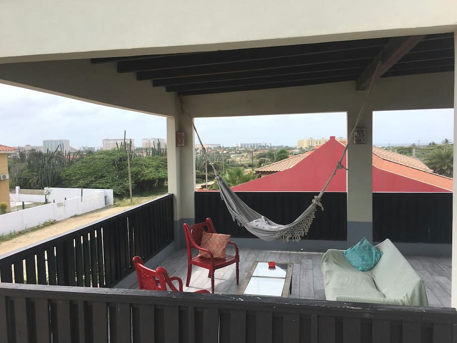 Upstairs deck with view of the high rise and highwinds location