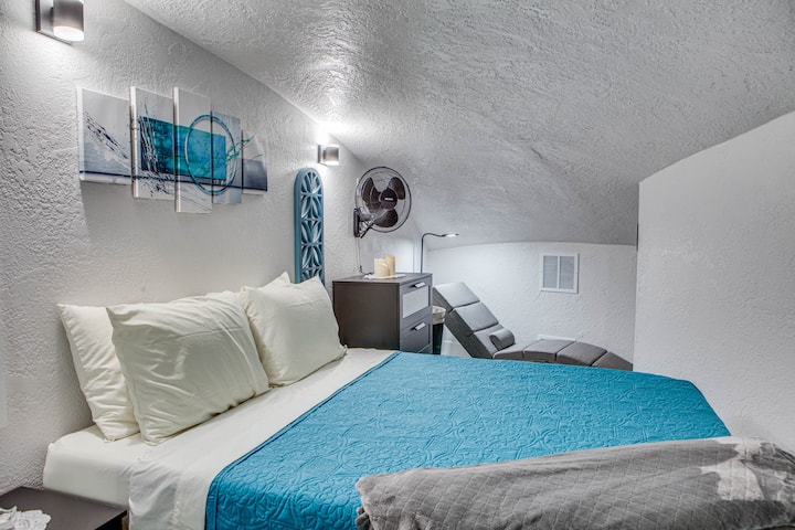 Secondary loft space consists of a queen bed and a quiet reading space. Please be advised: loft area is not recommended for those over 6' tall as the dome has areas that are shorter than 6' and is constructed of solid concrete therefore, a bump of the head would be quite painful.