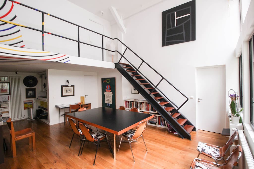 Dining table for 8 and stairs to first floor