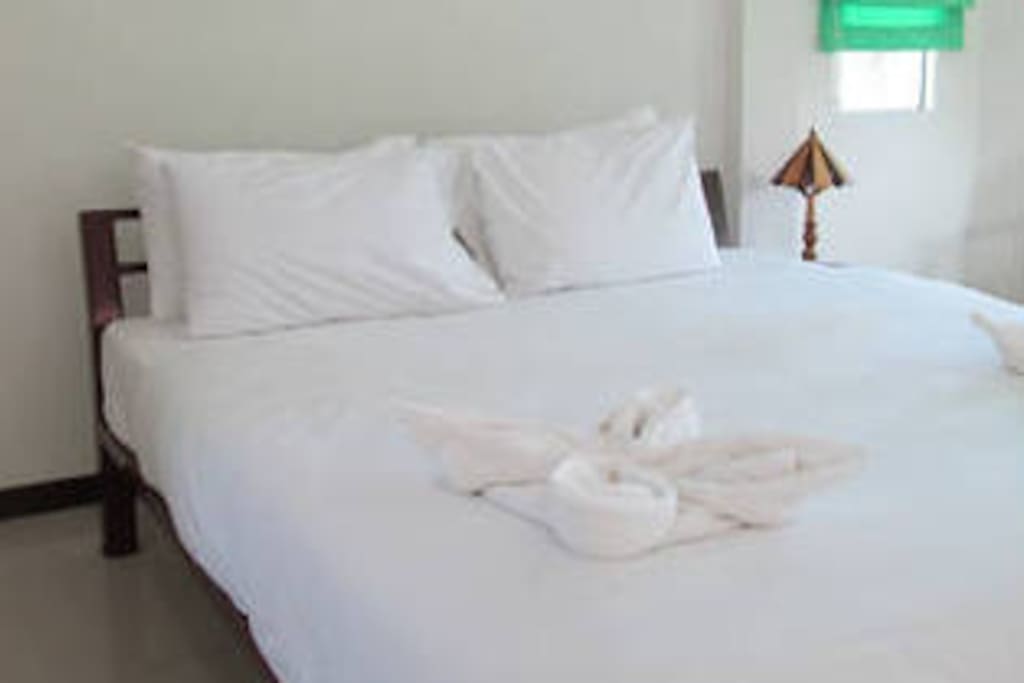 Spacious master bedroom with bathroom and AC