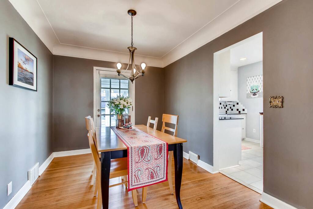 Dining room that leads to a three-season porch with bi-fold doors. Easily the most unique feature of this home, you'll have a view onto nature in action.
