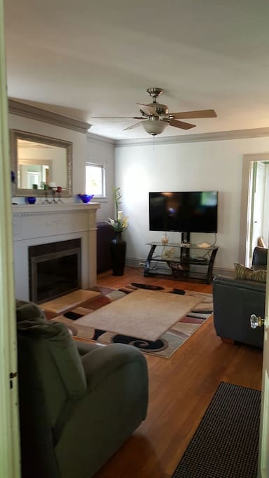 Flat screen tv, fireplace, homey feel.