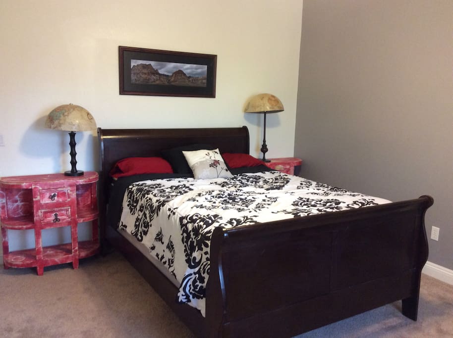 The spacious bedroom enjoys plenty of natural light.