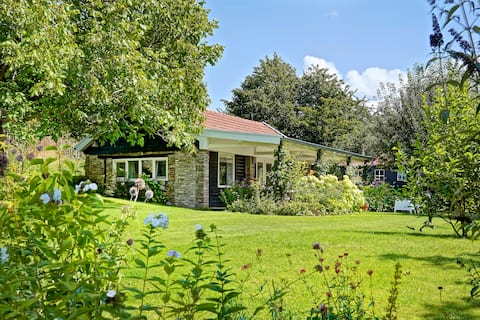 Cottage with beautiful view in hilly countryside