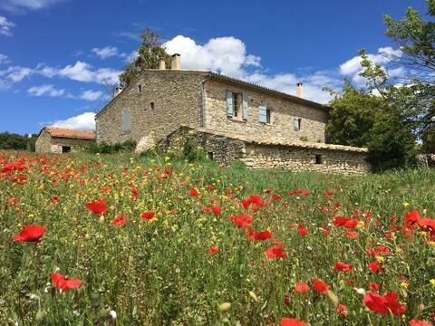 Beautiful stone farmhouse surrounded by nature