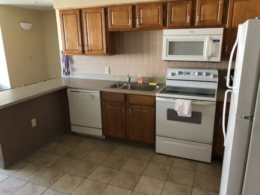 Includes stove,microwave, dishwasher and full sized refrigerator