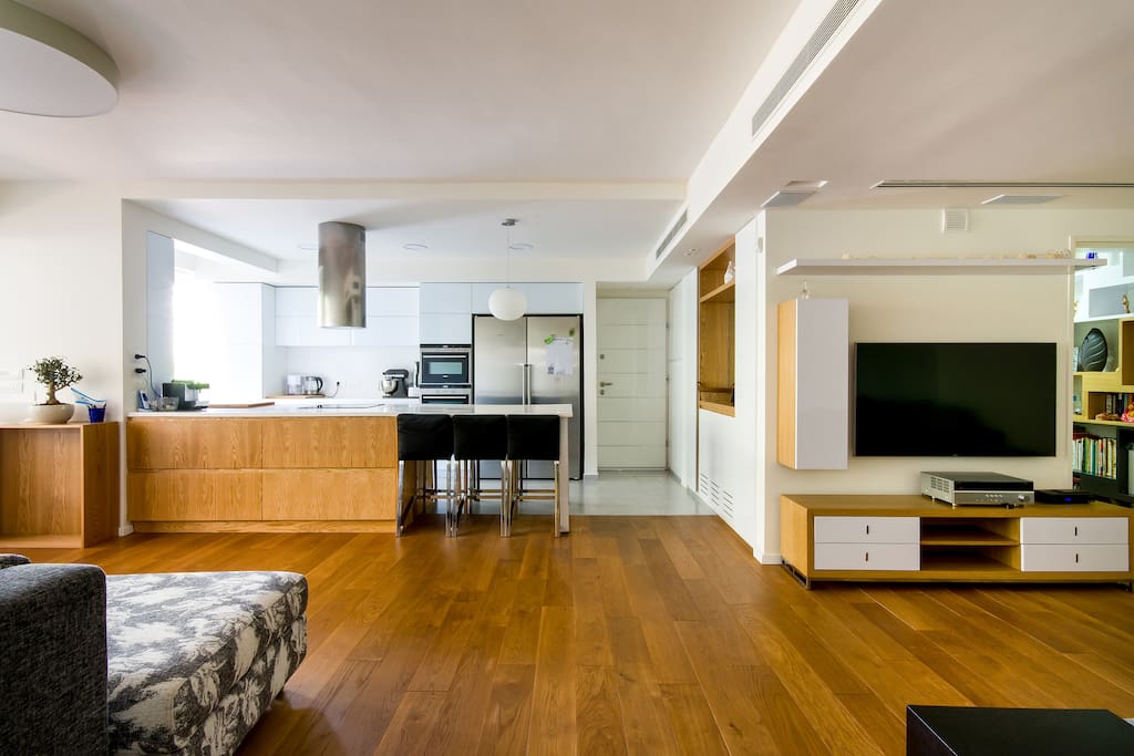 View to living room, TV room and fully equipped kitchen
