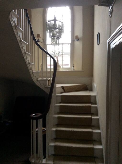 Original staircase with mahogany rail