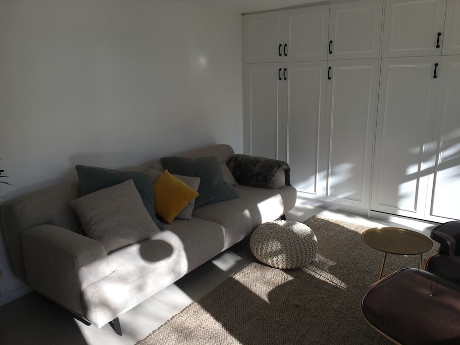 lounge / living room with cupboards shut