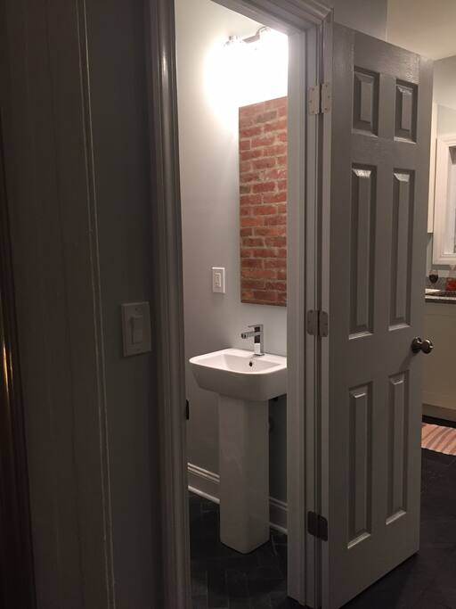 New and stylish 1/2 bath on the main level.