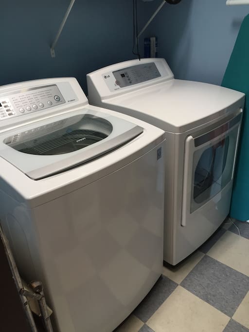 Washer and dryer off of the bathroom.