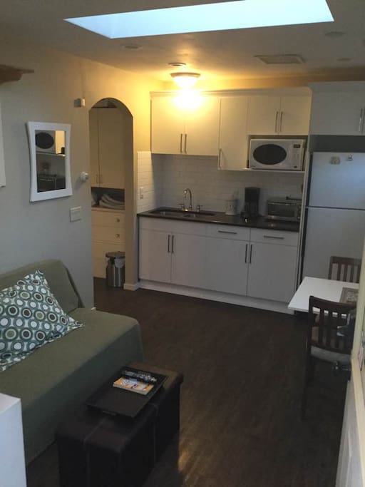 Main Living area.
Sitting room with attached kitchenette. Sofa bed converts to a small double bed. (Suitable for two children, 1 adult, or two smaller adults who like to cuddle...)