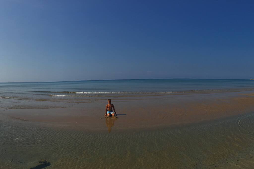 beach in front of the house
