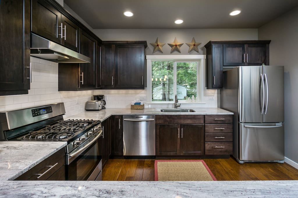 This brand new quality built home has a gorgeous well-stocked kitchen - bring your favorite recipes!