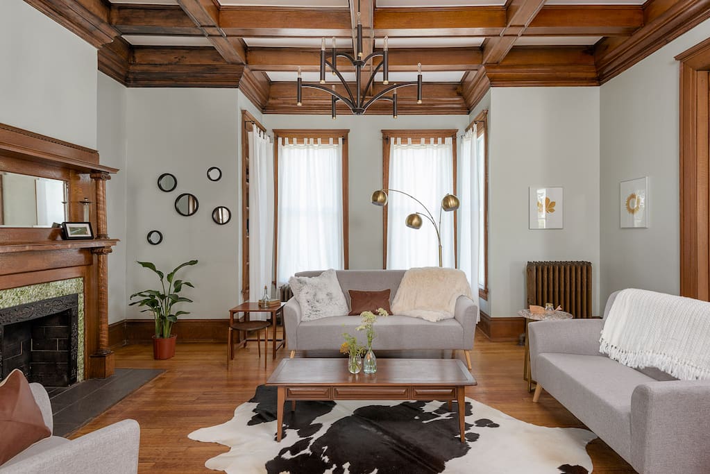 We love the calm of these rooms, big windows letting sunlight bring the oak trim to life.