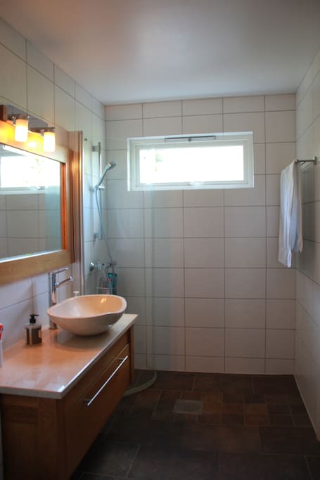 Modern and newly renovated bathroom that you will share with us.