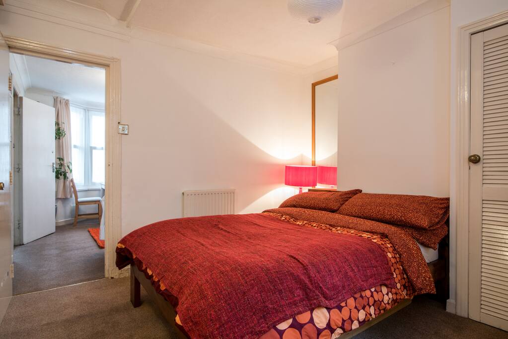 Really comfortable Memory foam Mattress and Pillows on a lovely Warren Evans wooden bed.