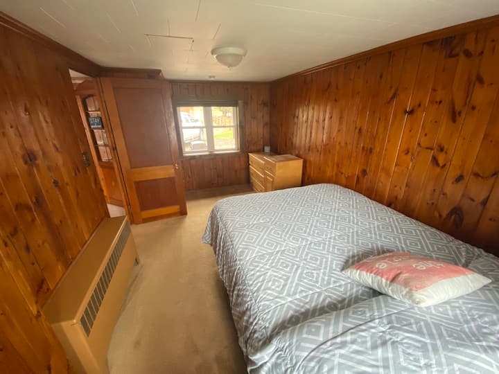 Master bedroom looking from the head of the bed. This is a queen bed. Please bring your own pillows, bedding and blankets, they are not included.