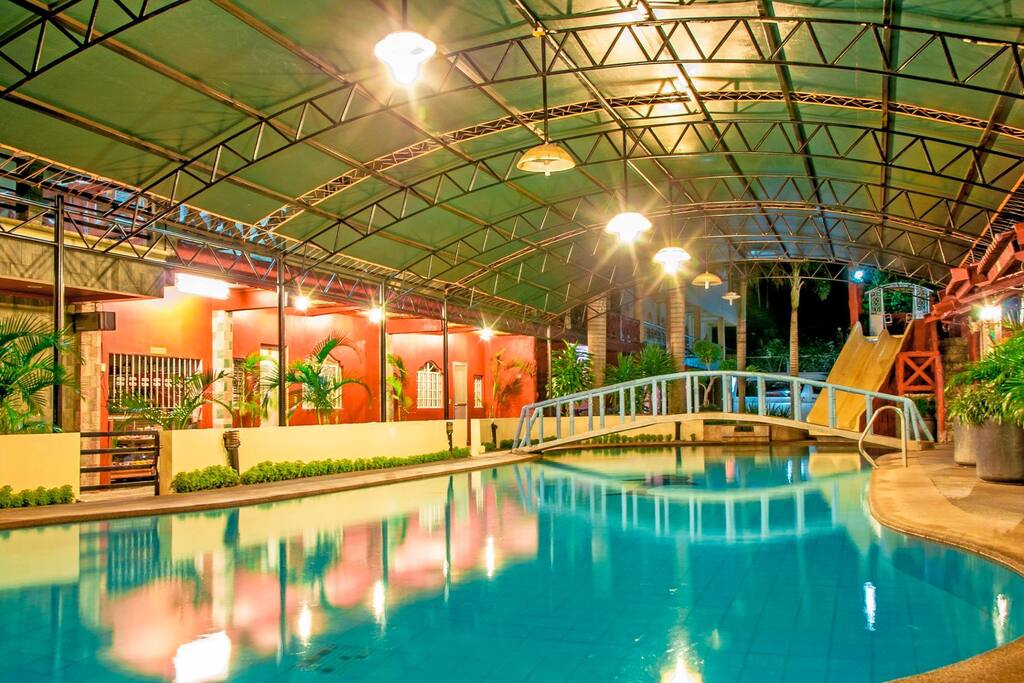 SWIMMING POOL (ADULT AND KIDDIE POOL WITH SLIDE) AND JACUZZI