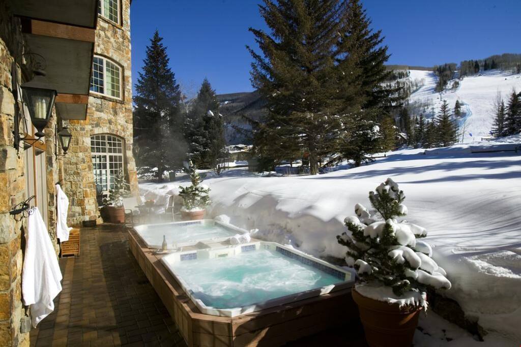 Take a relaxing soak int he outdoor hot tubs with mountain views.