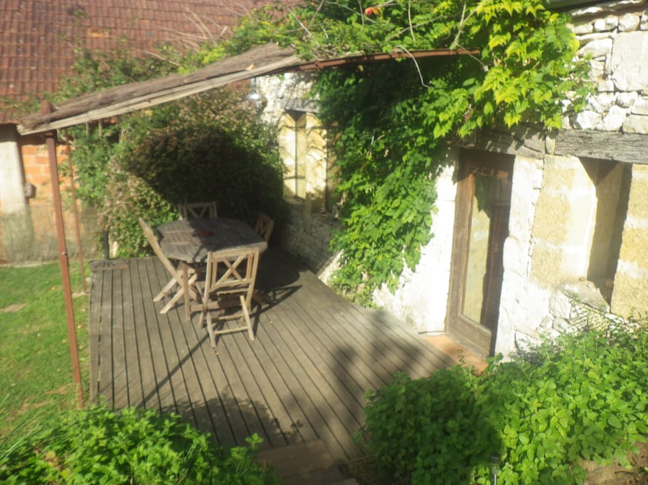 The wooden terrace: access via the back door - perfect for yoga practice, sunset gazing & long summer dinners.