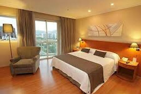 Suíte ampla / Serviço de Apart Hotel