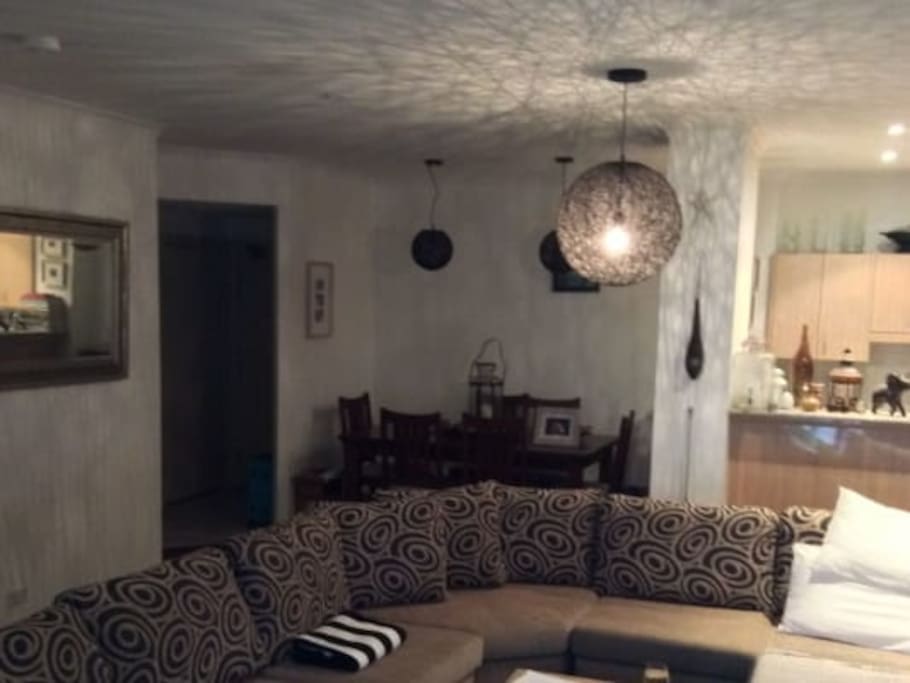 Large lounge room and dining table