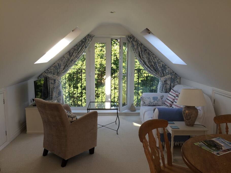 Loft Suite living area with views of garden