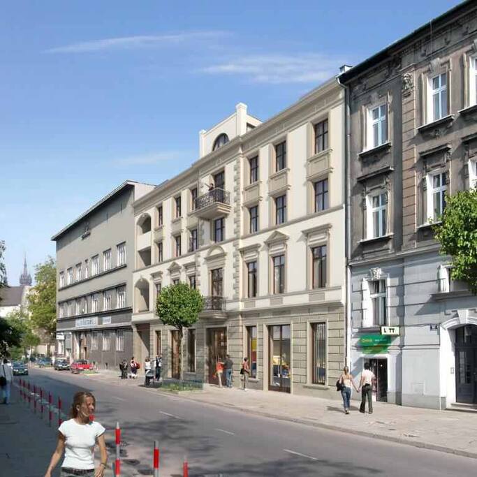 The building (the middle one) where the flat is located on the 2nd floor. The flat faces away from the street, overlooking the garden