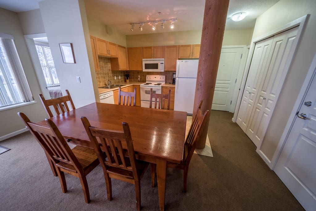 Bright open dining area with access to the kitchen for easy meal prep and entertaining family and friends