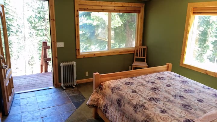 Wake to a Spectacular Sunrise Overlooking Several Mountain Ranges in Bedroom Suite 2 with Queen Bed, Queen  Floor Mattress, 5' x 3' Sleeping Platform in Walk-in Closet, Private Granite Jetted Tub for Two. Step Out to Your Private Deck and Back Yard.