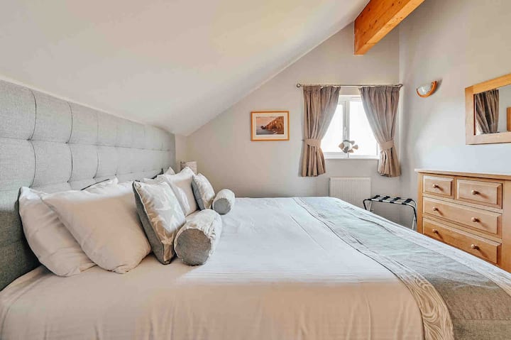 Glavna spavaća soba na prvom katu u Puffin Lodgeu