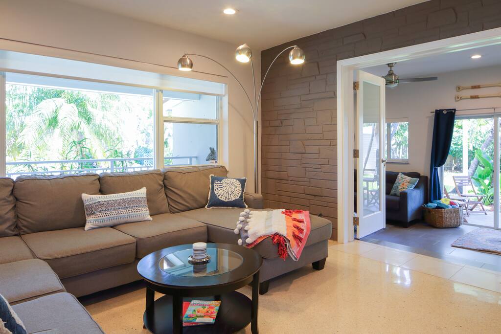 This cozy living room is ideal for relaxing and/or watching your favorite show on the big screen TV