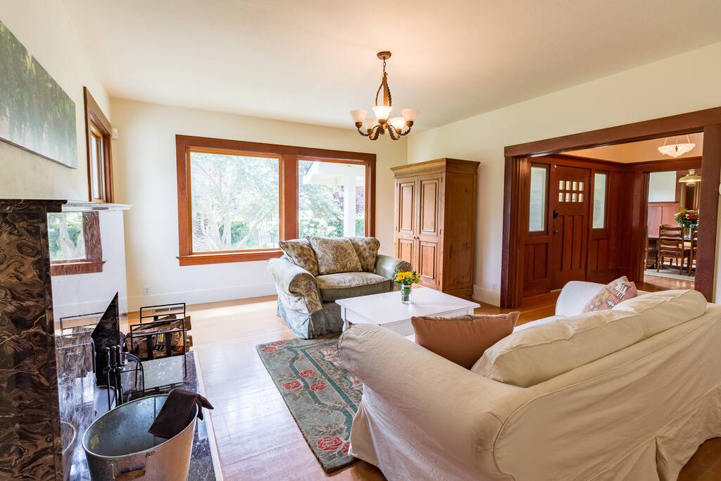 The marble fireplace is the focal point of the living room.