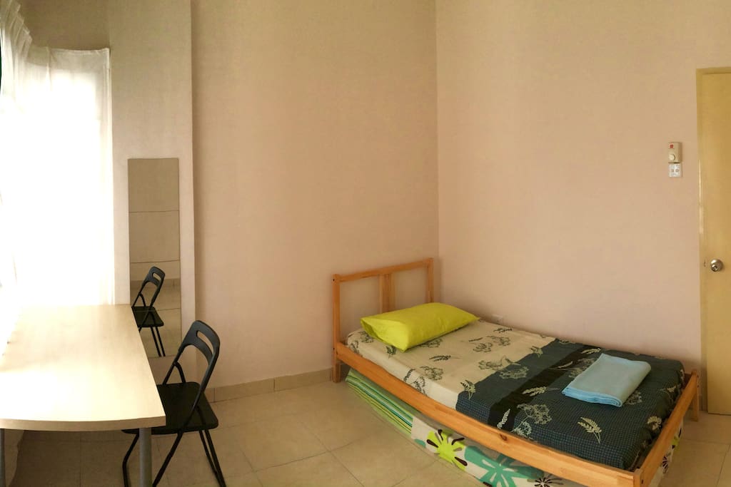 Well-lit room that can fit up to two people.