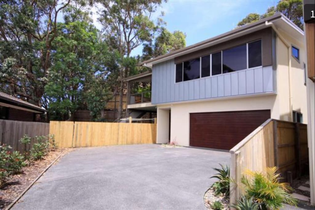 Northerly aspect with vegie patches and an outdoor hot shower surrounding the property