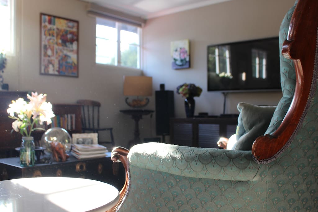 Our house is light and airy with a large home entertainment system.