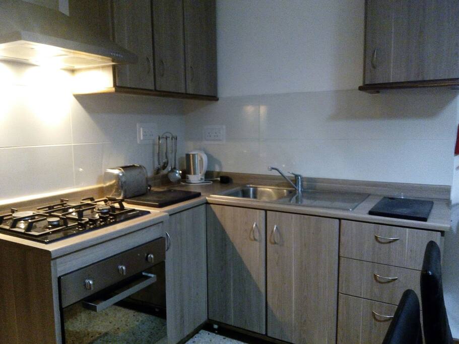 Kitchen, equipped with appliances and cookware