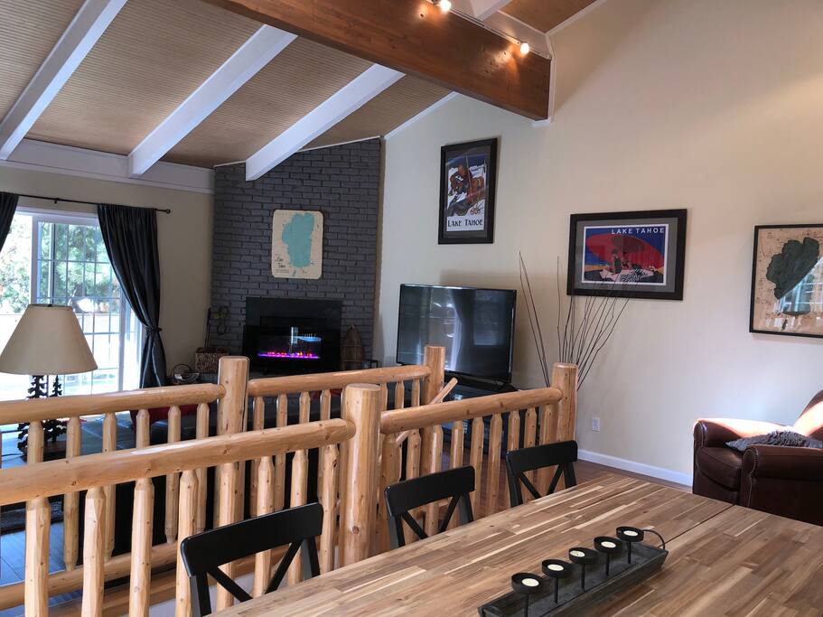 Open floor plan makes eat easy for everyone to hang out upstairs. Bedrooms and baths downstairs for those who want to take naps :-)